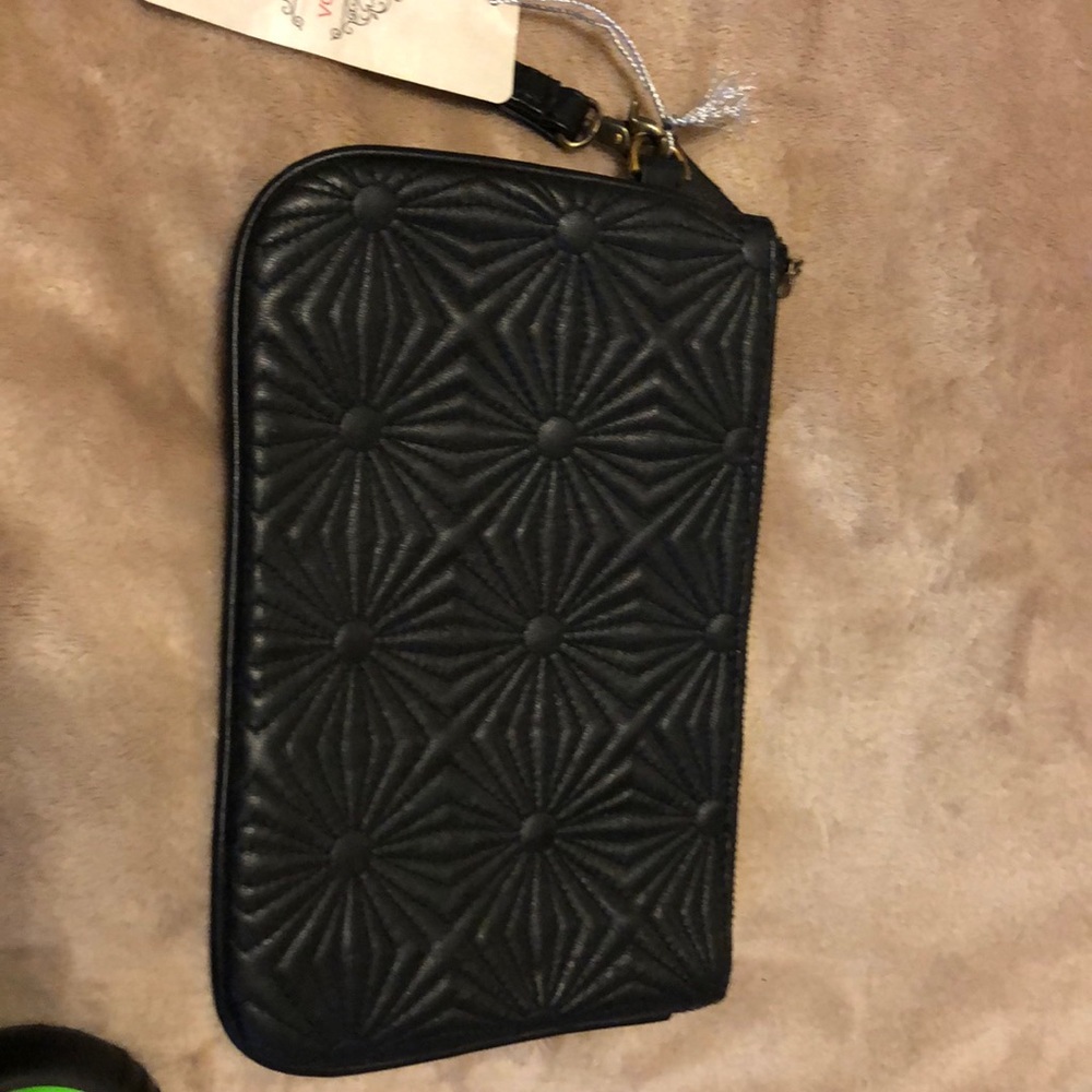 Women’s black genuine leather clutch
